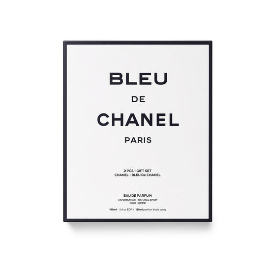 A framed minimalist poster featuring the text 'BLEU DE CHANEL PARIS' in black on a white background, with smaller text below indicating a 2-piece gift set and 150ml eau de parfum. The poster is presented in a thin black frame against a clean white background.